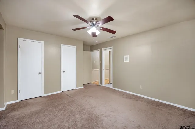 a view of a backyard with tree s