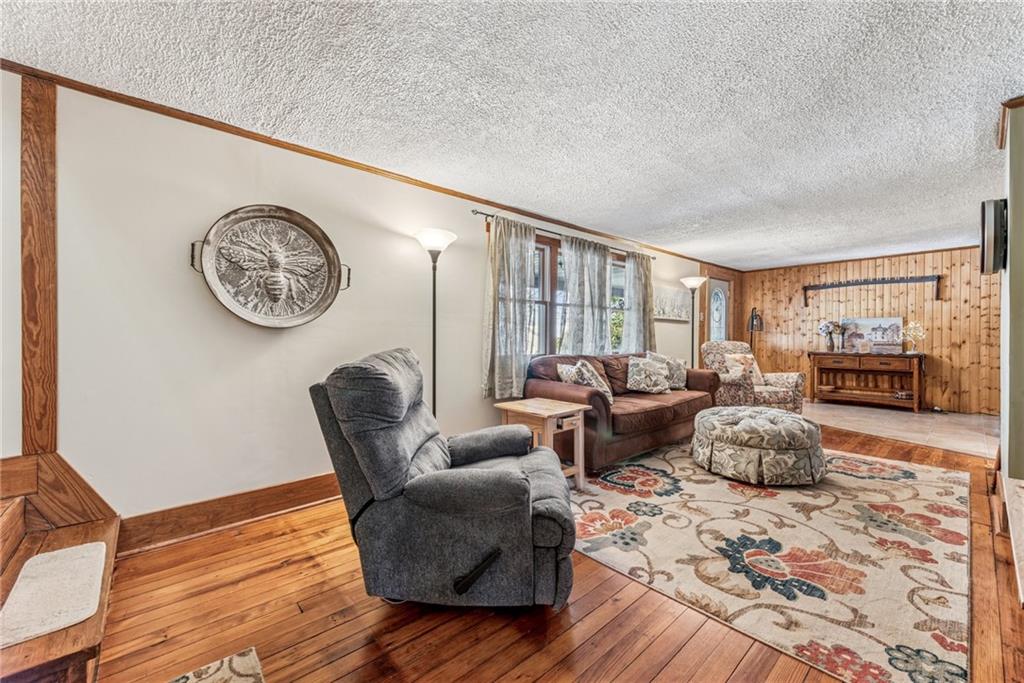 3150 Dutch Ridge Road Beaver, PA 15009 - Photo 11 of 41 a living room with furniture and a table