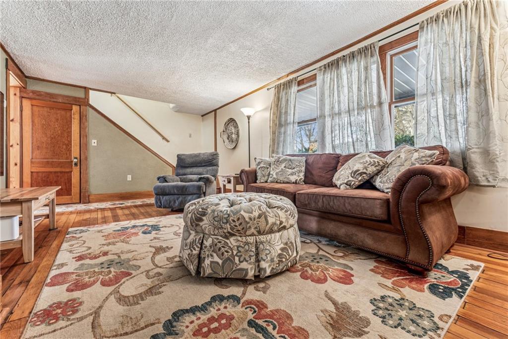 3150 Dutch Ridge Road Beaver, PA 15009 - Photo 12 of 41 a living room with furniture and a large window