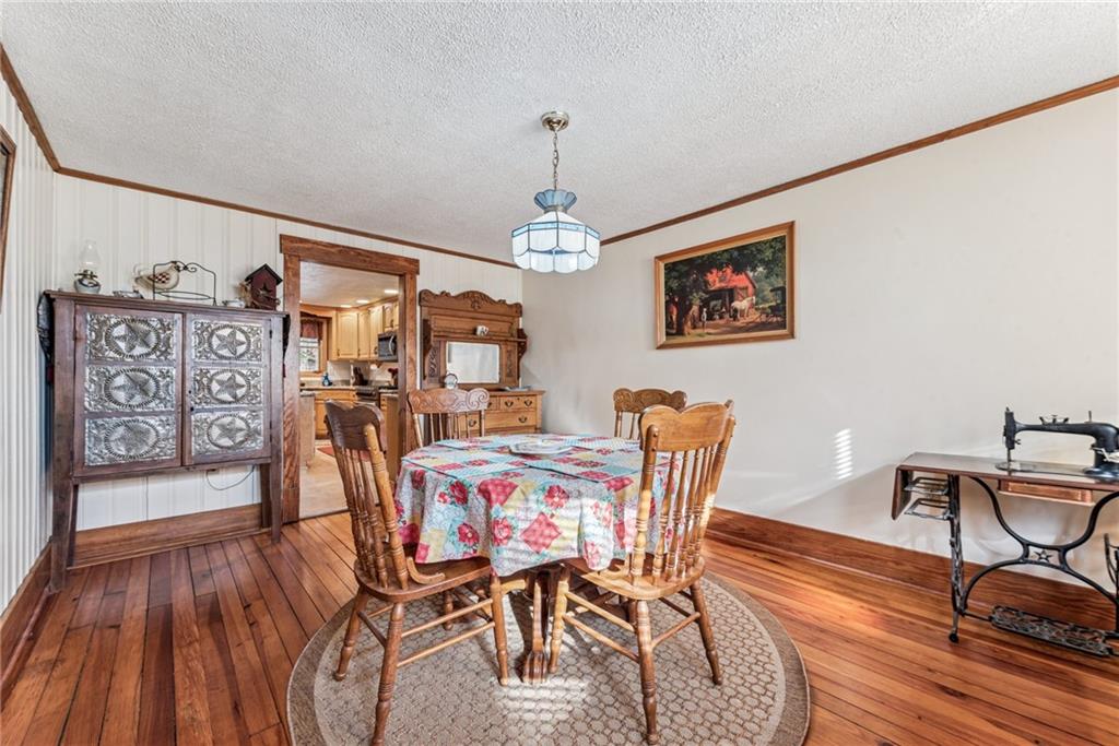 3150 Dutch Ridge Road Beaver, PA 15009 - Photo 17 of 41 a view of a dining room with furniture window and wooden floor