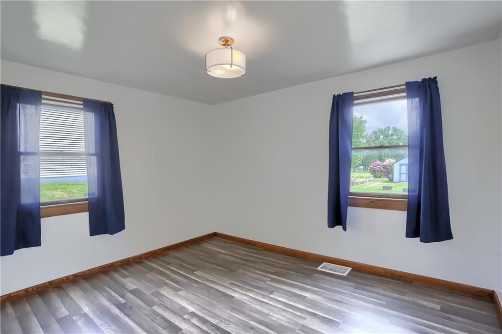 1081 Evans City Road Renfrew, PA 16053 - Photo 13 of 24 a view of an empty room and window