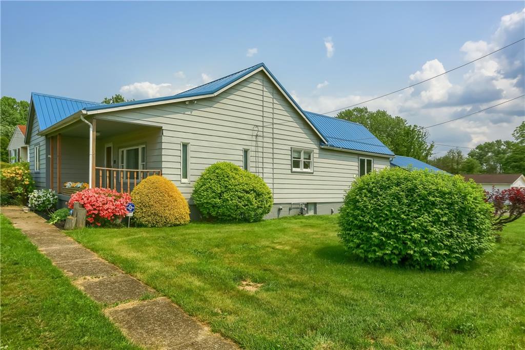 1081 Evans City Road Renfrew, PA 16053 - Photo 24 of 24 a view of a house with a garden