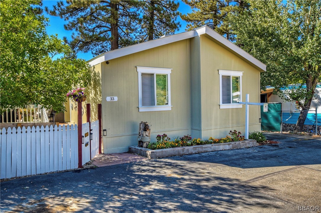 547 Alden Road, Unit 33 Big Bear Lake, CA 92315 - Photo 28 of 28 a front view of a house with garden