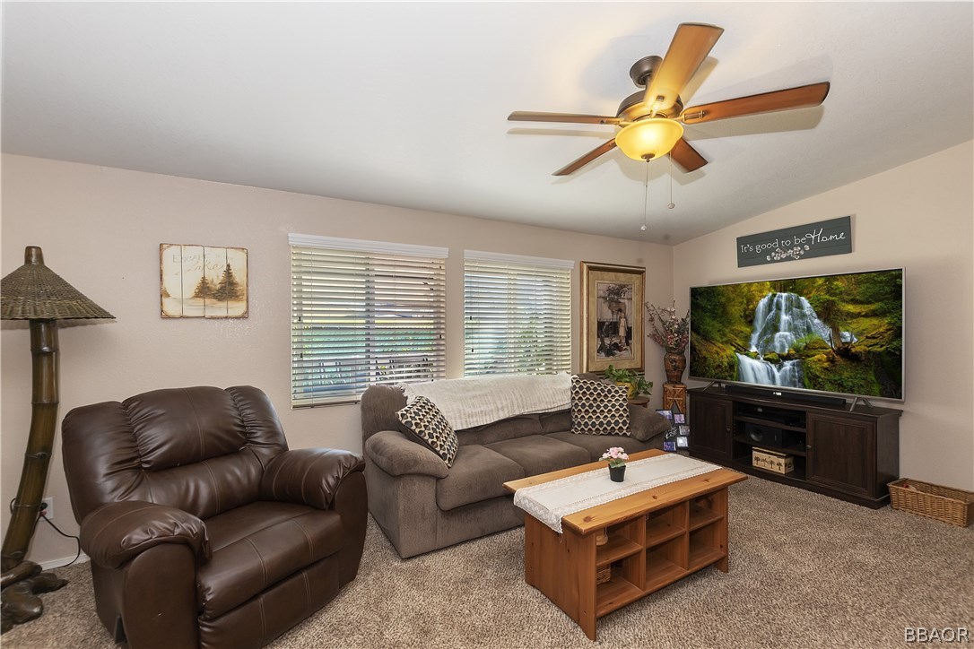 547 Alden Road, Unit 33 Big Bear Lake, CA 92315 - Photo 6 of 28 a living room with furniture and a flat screen tv