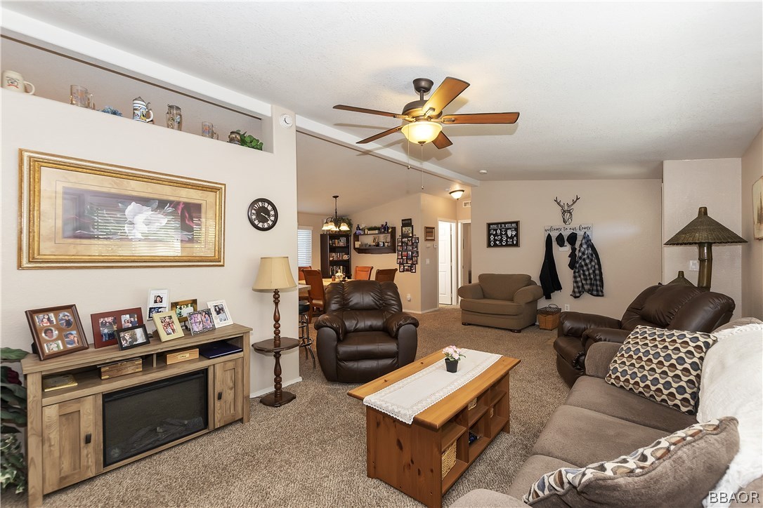547 Alden Road, Unit 33 Big Bear Lake, CA 92315 - Photo 8 of 28 a living room with furniture and wooden floor