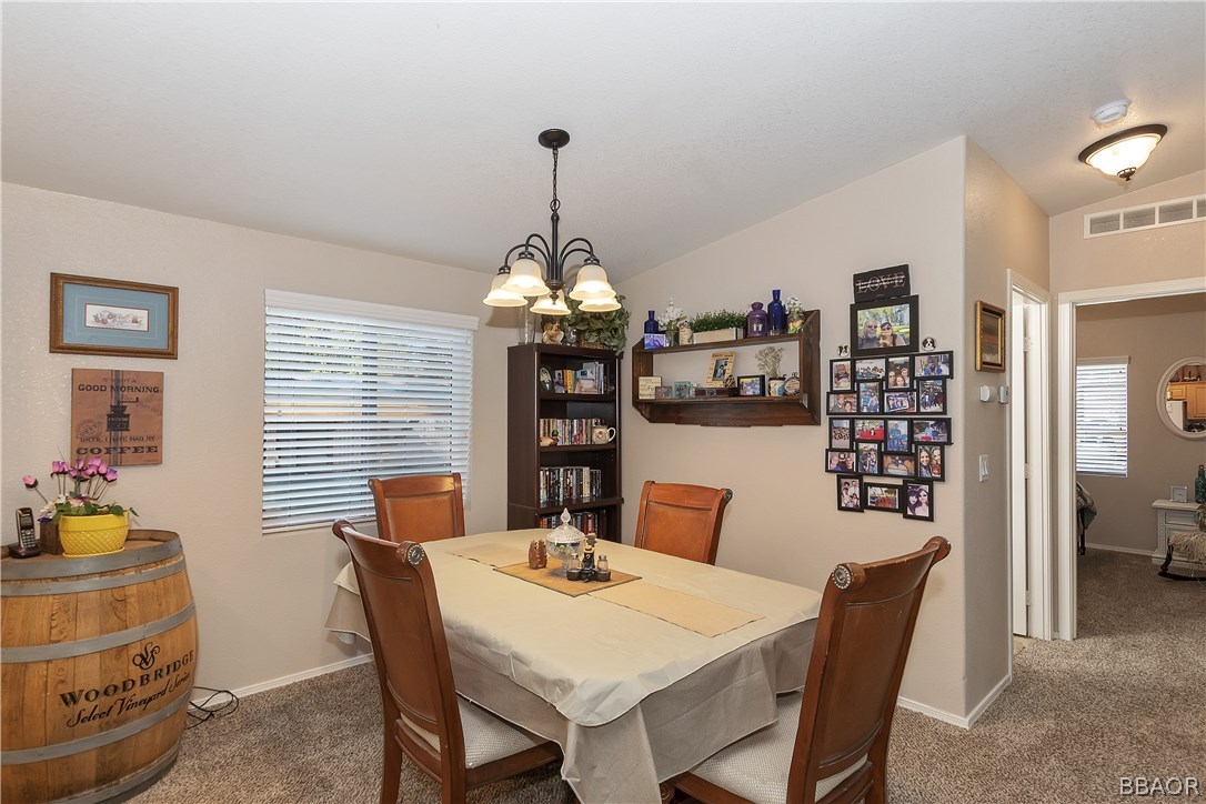547 Alden Road, Unit 33 Big Bear Lake, CA 92315 - Photo 9 of 28 a view of a dining room with furniture