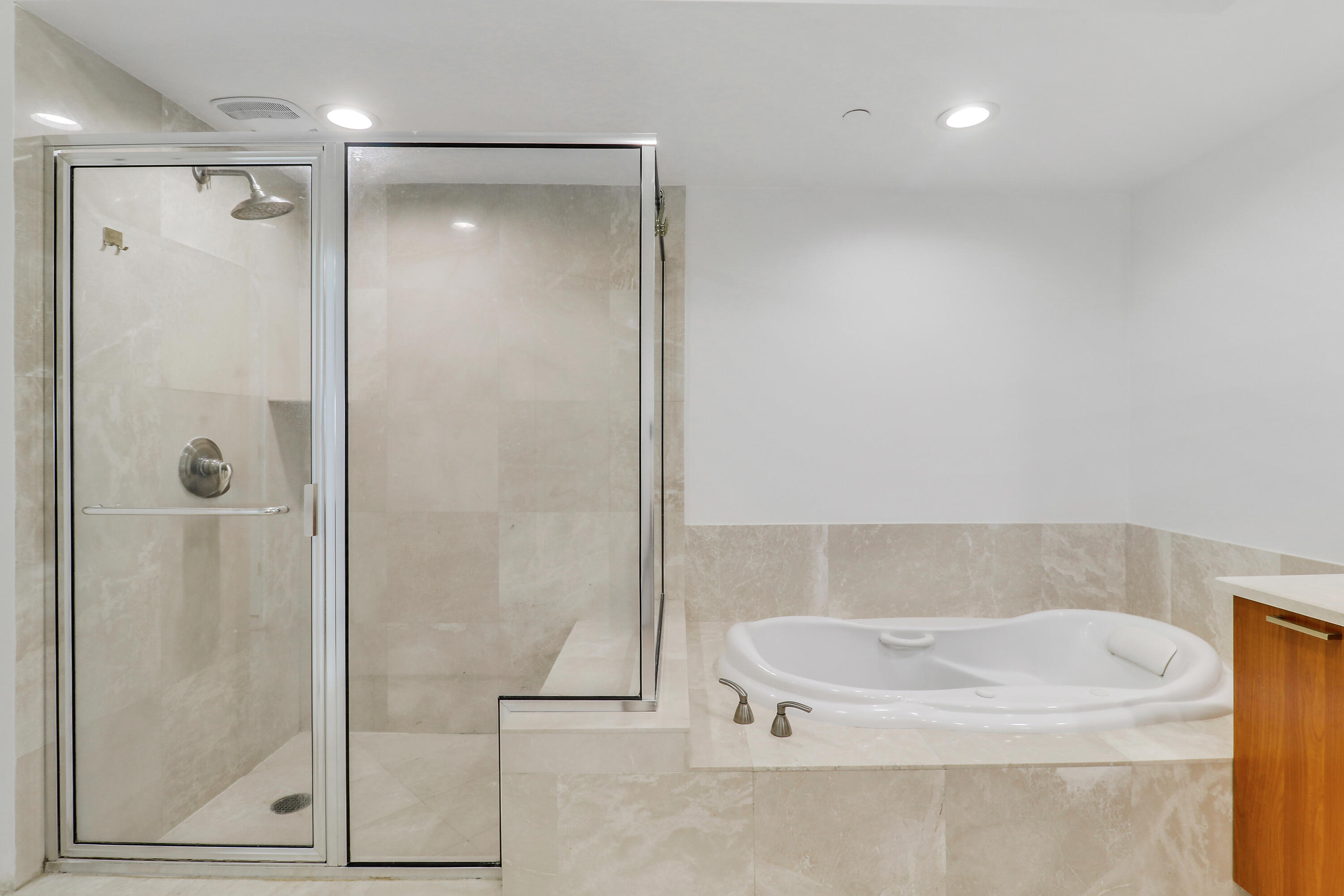 2640 Lake Shore Drive, Unit 307 Riviera Beach, FL 33404 - Photo 32 of 44 a bathroom with a shower and a sink