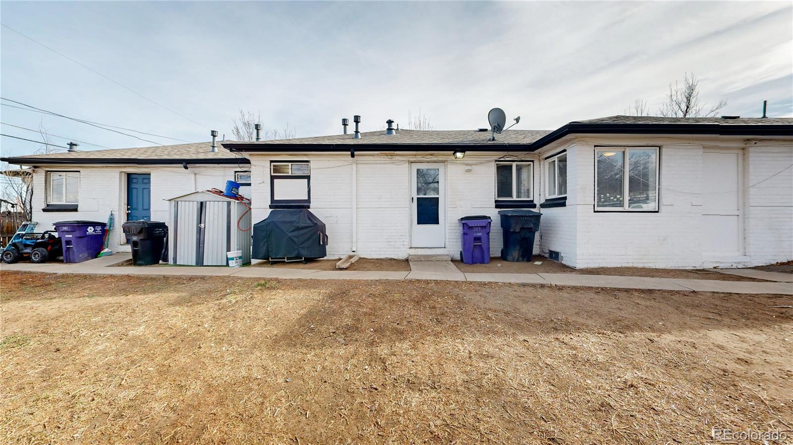 345 South Utica Street Denver, CO 80219 - Photo 18 of 19 a view of a car park in front of house