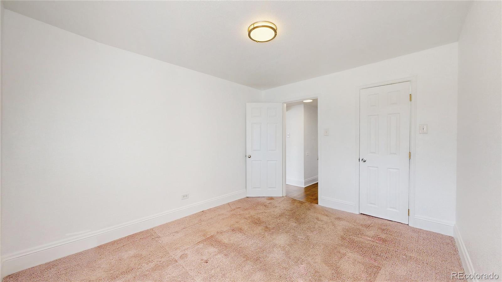 345 South Utica Street Denver, CO 80219 - Photo 8 of 19 a view of an empty room