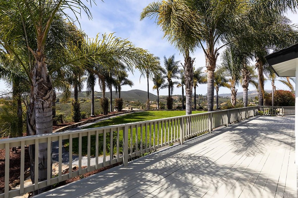 6949 Elfin Oaks Road Escondido, CA 92029 - Photo 18 of 24 a view of a park with palm trees