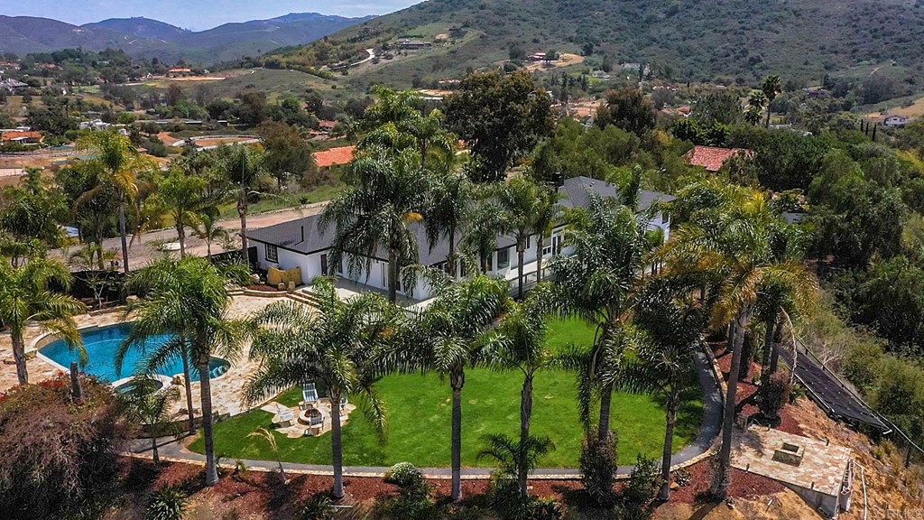6949 Elfin Oaks Road Escondido, CA 92029 - Photo 24 of 24 an aerial view of residential house with an outdoor space and seating