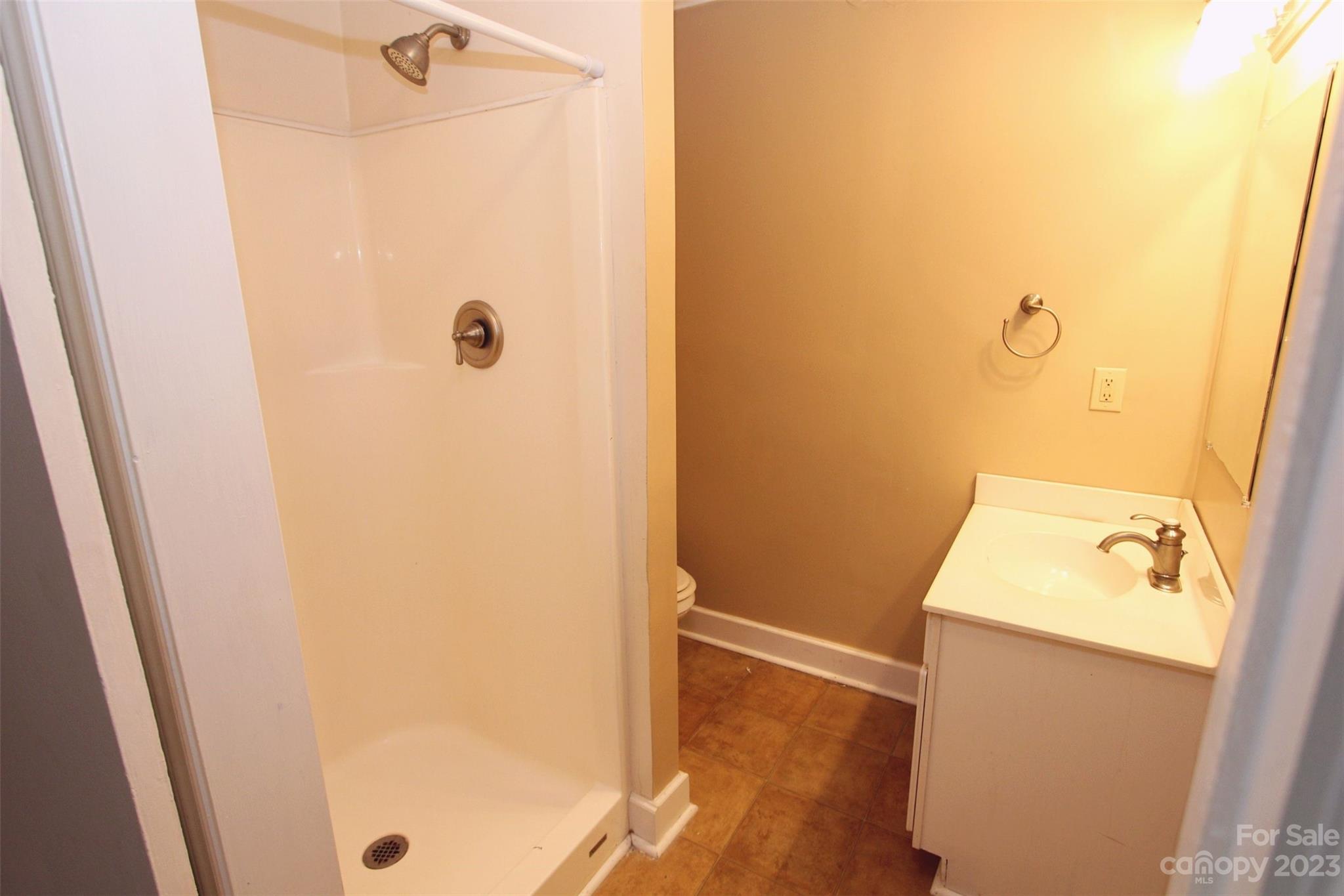 488 Savannah Road Peachland, NC 28133 - Photo 12 of 35 a bathroom with a sink and shower