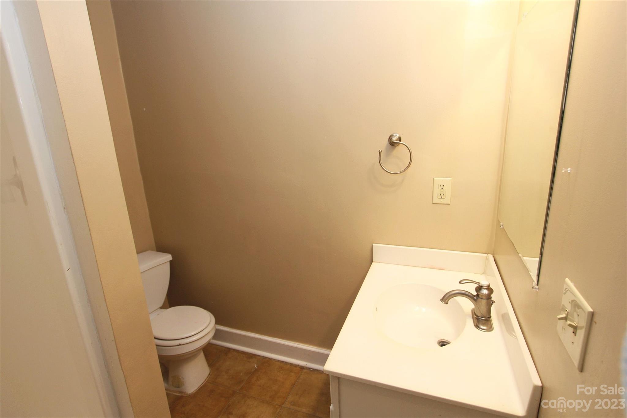 488 Savannah Road Peachland, NC 28133 - Photo 13 of 35 a bathroom with a toilet and sink