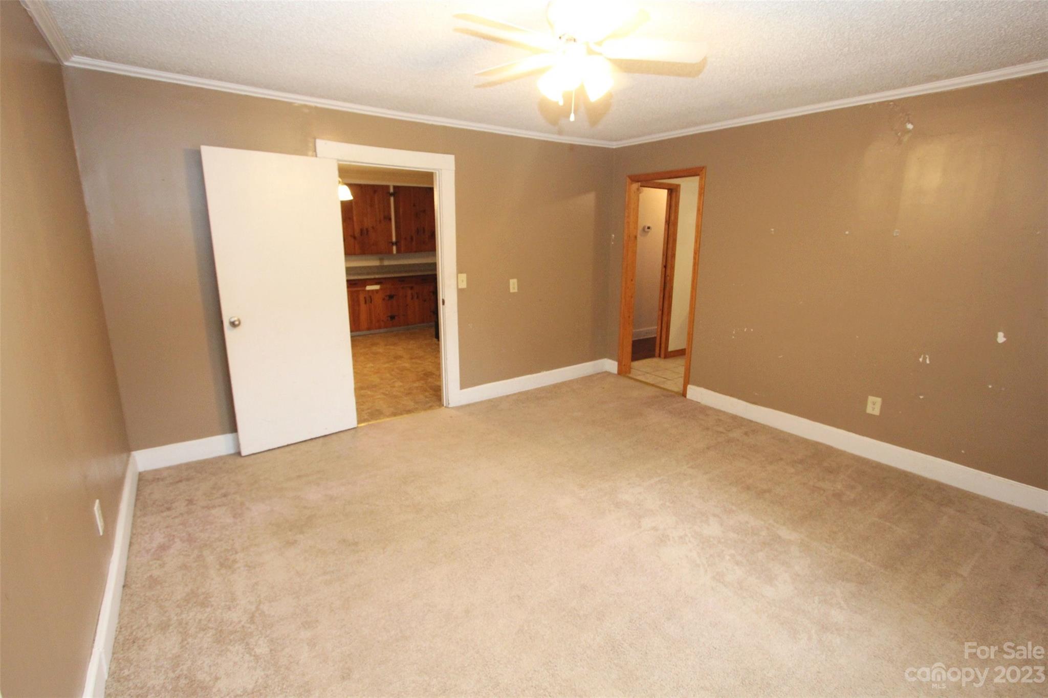 488 Savannah Road Peachland, NC 28133 - Photo 15 of 35 an empty room with closet and wooden floor