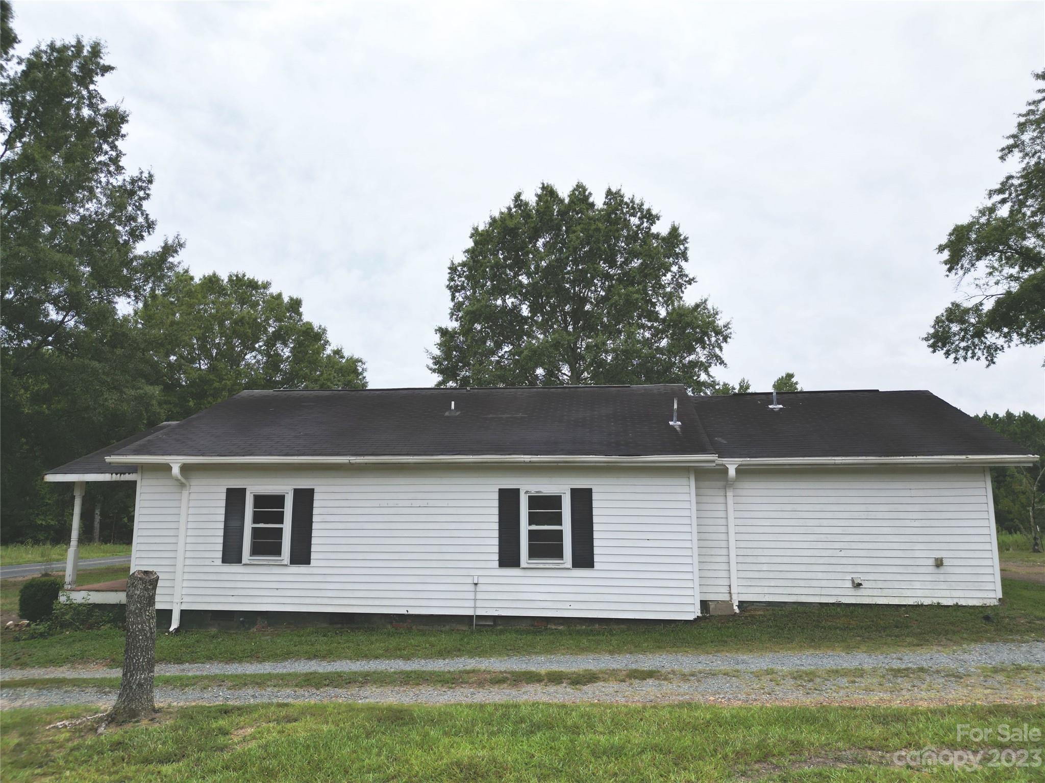 488 Savannah Road Peachland, NC 28133 - Photo 4 of 35 a view of a house with a backyard