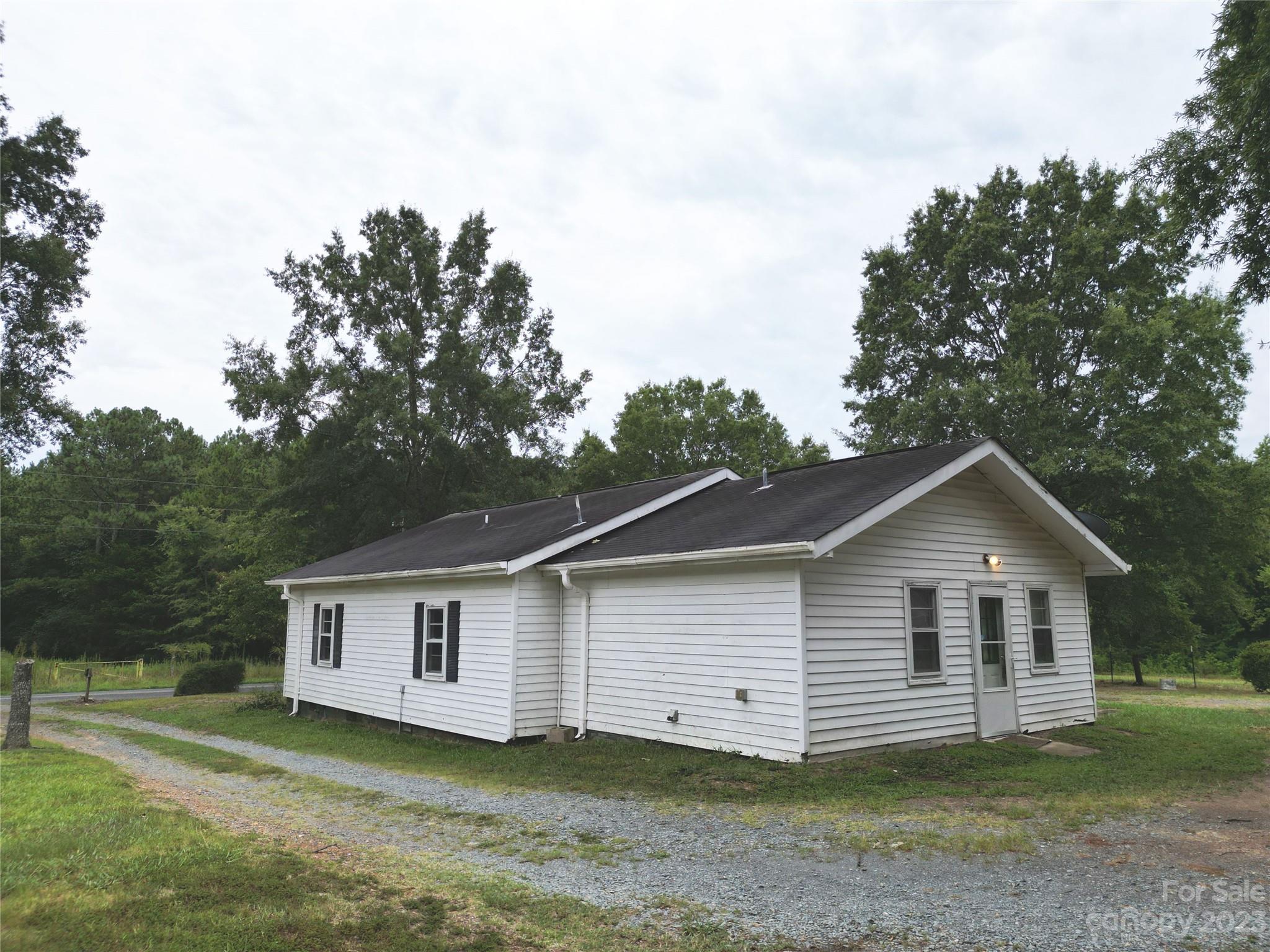 488 Savannah Road Peachland, NC 28133 - Photo 5 of 35 a view of a house with a yard