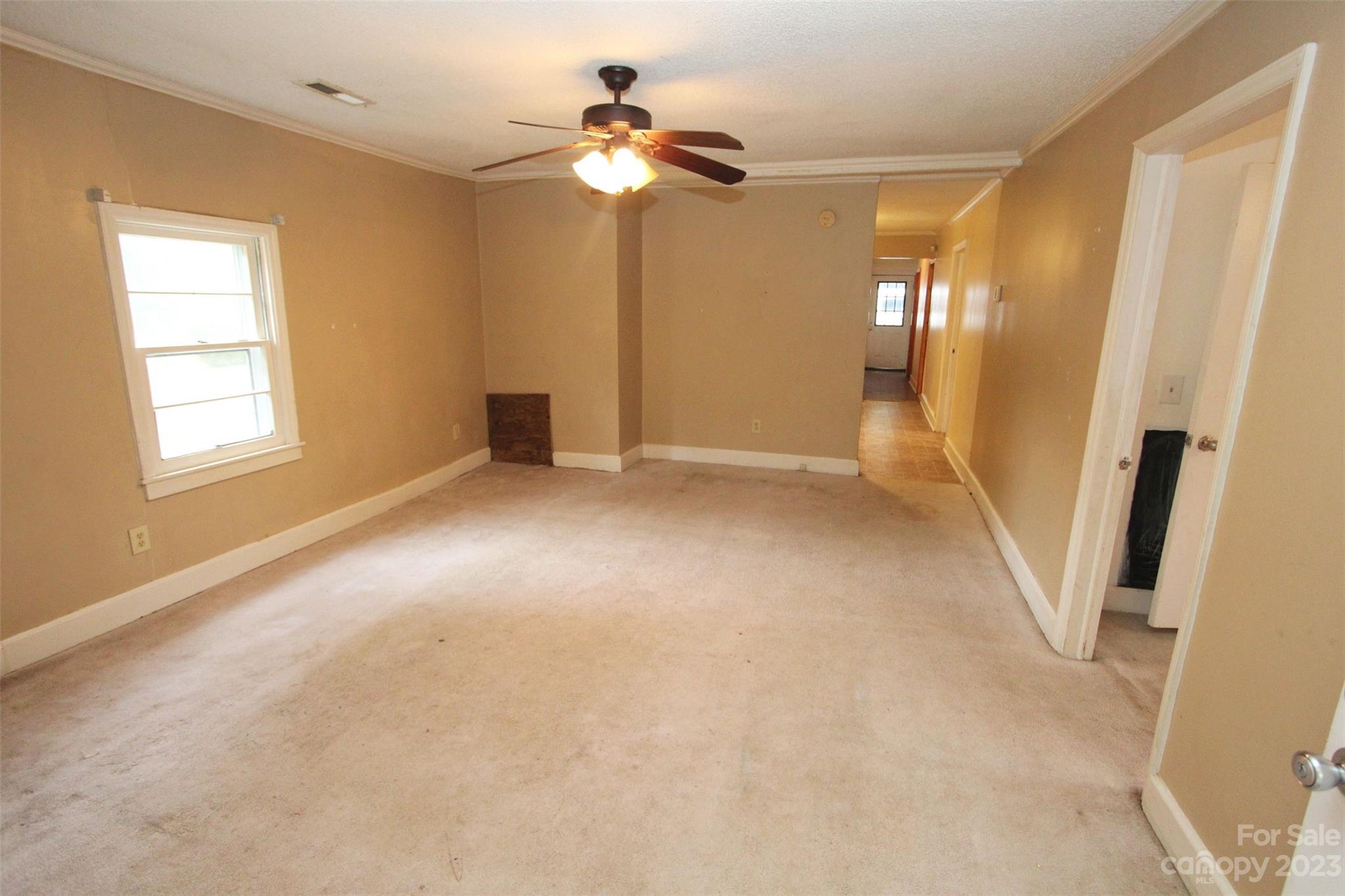 488 Savannah Road Peachland, NC 28133 - Photo 8 of 35 an empty room with windows and entrance