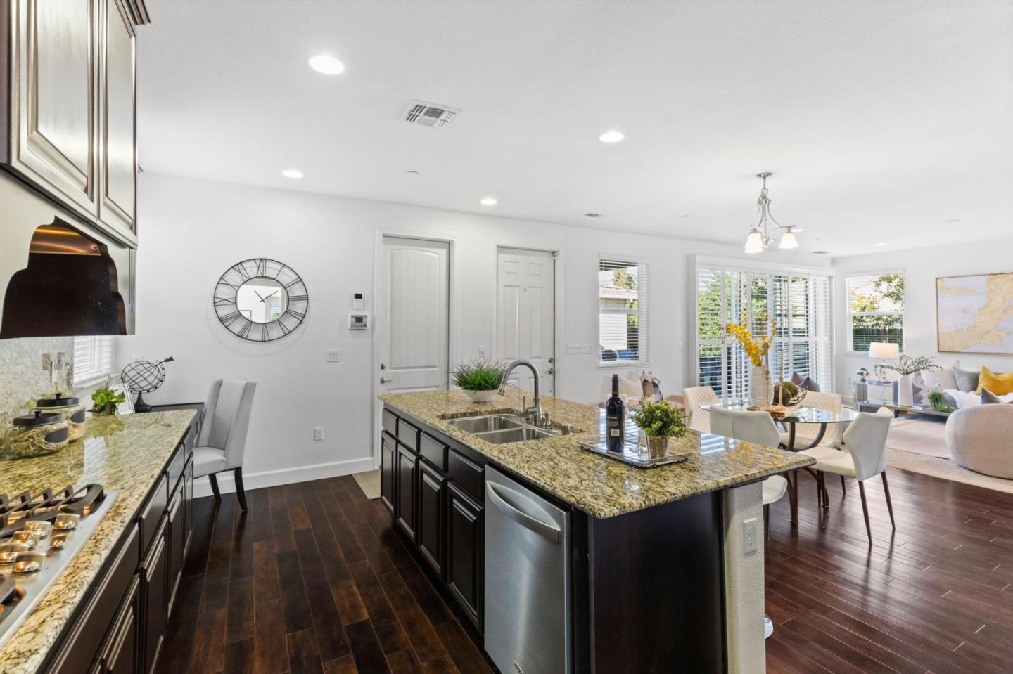 823 Sunrise Drive Gilroy, CA 95020 - Photo 13 of 46 a view of a dining room with furniture window and wooden floor