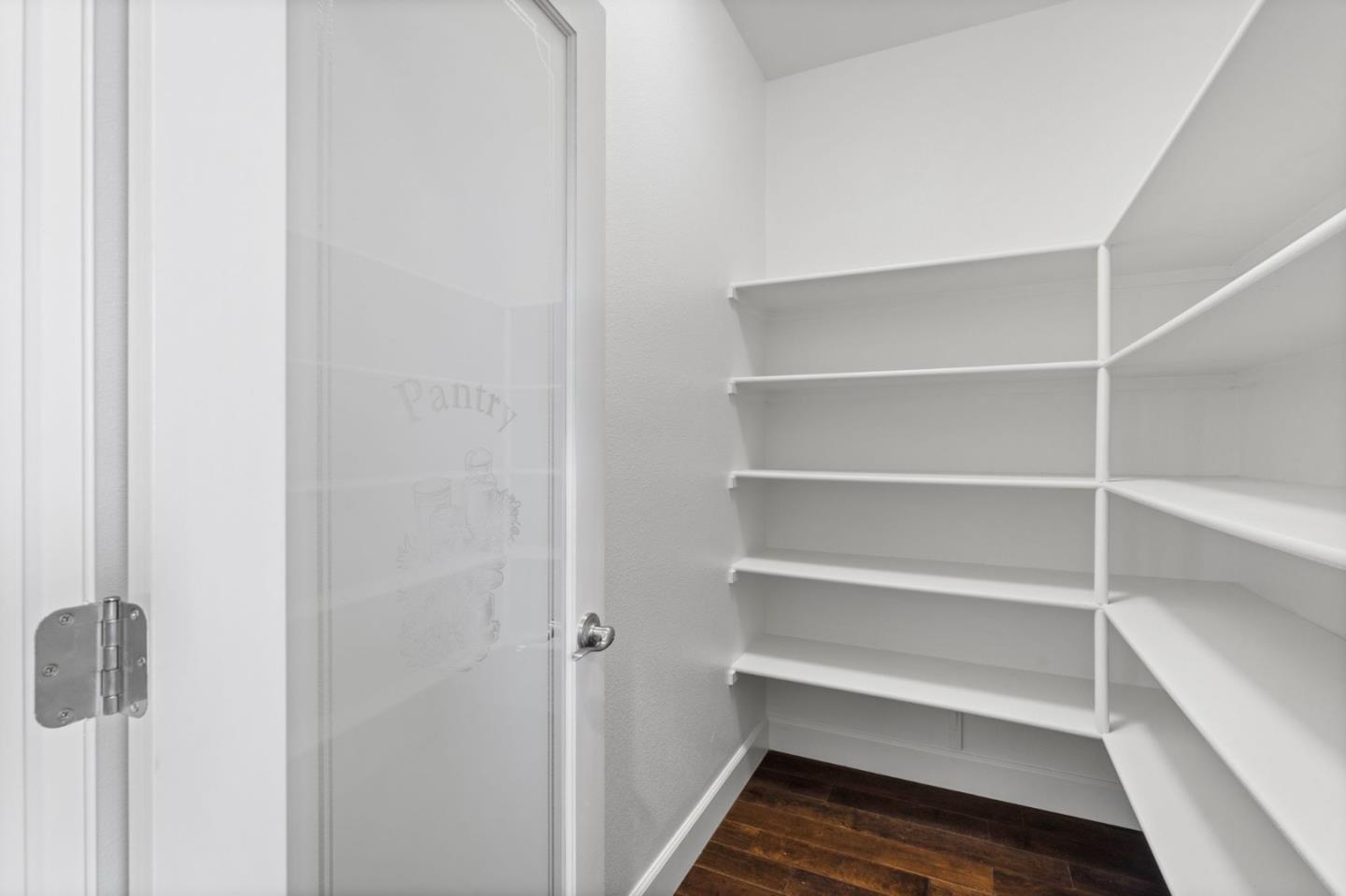 823 Sunrise Drive Gilroy, CA 95020 - Photo 14 of 46 a storage room with empty racks