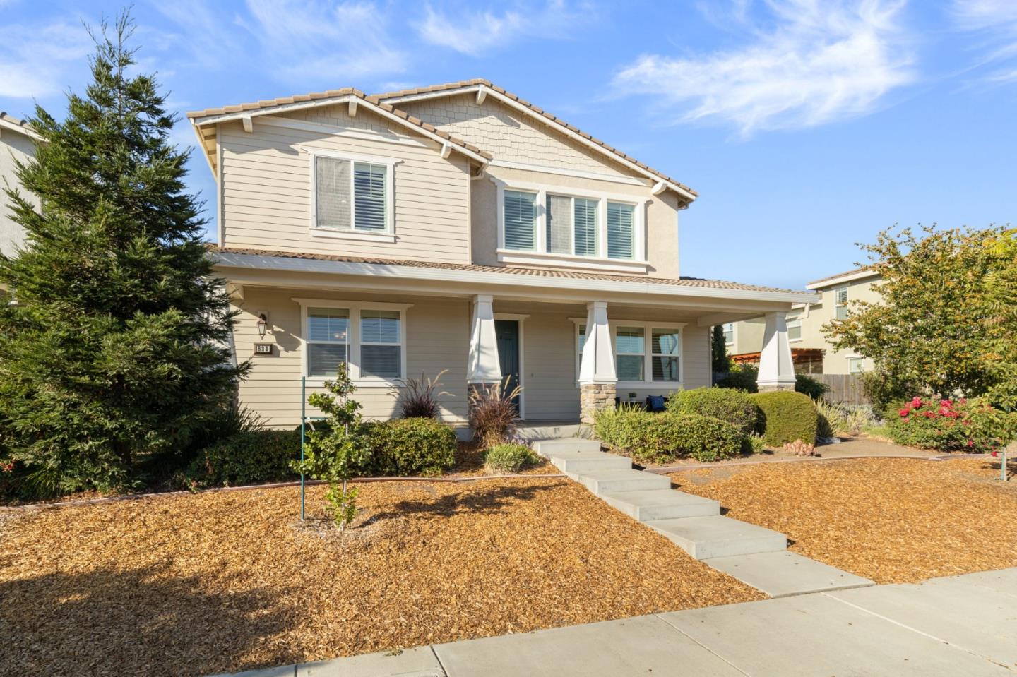 823 Sunrise Drive Gilroy, CA 95020 - Photo 2 of 46 a front view of a house with a yard and trees