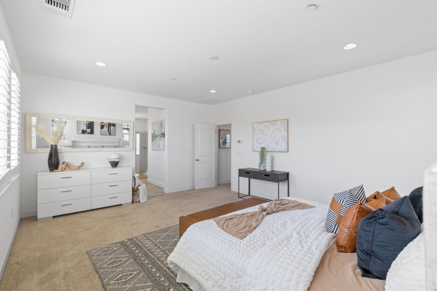 823 Sunrise Drive Gilroy, CA 95020 - Photo 25 of 46 a spacious bedroom with a bed and a cabinets