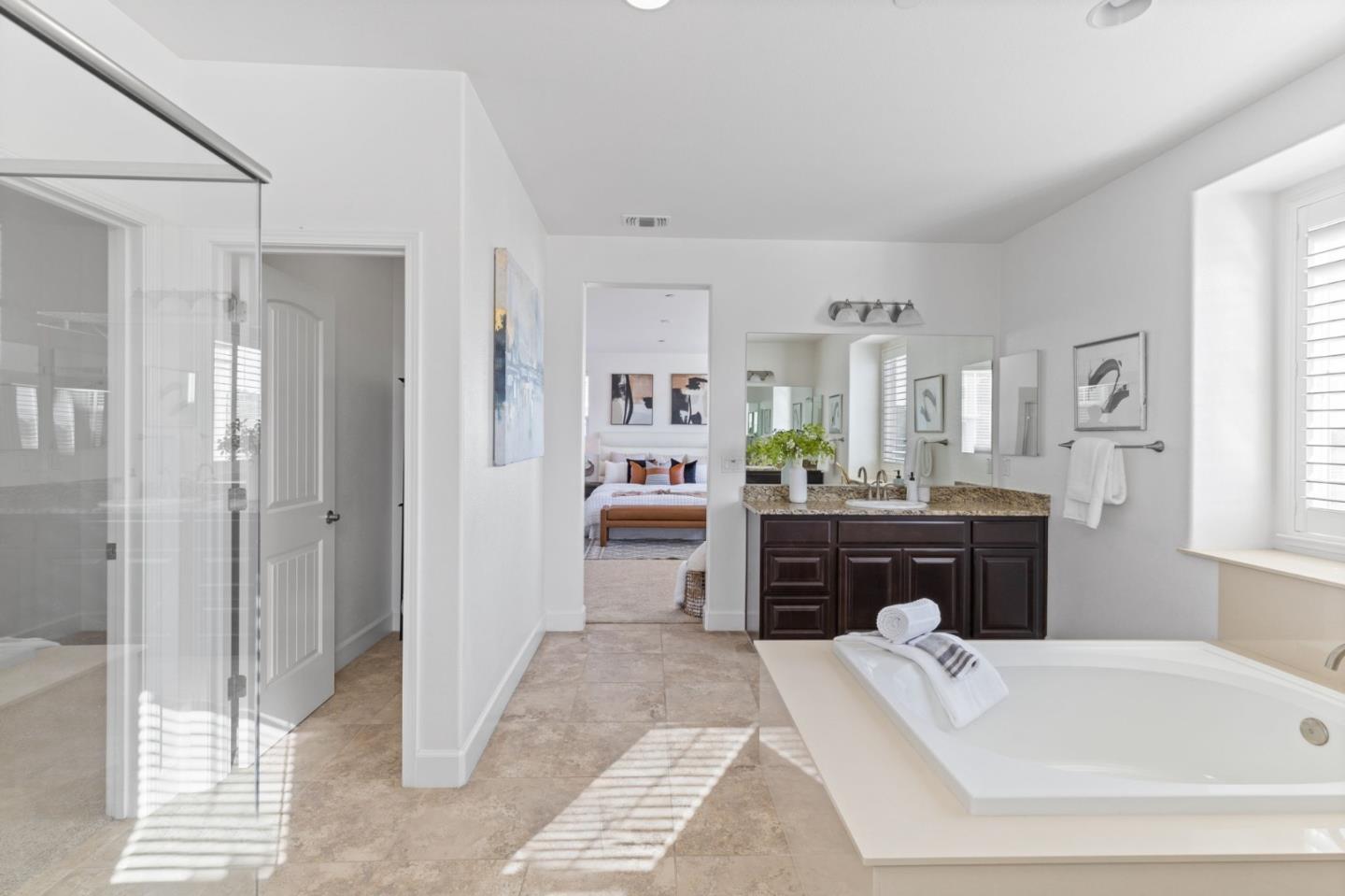 823 Sunrise Drive Gilroy, CA 95020 - Photo 27 of 46 a large bathroom with a tub sink shower and mirror