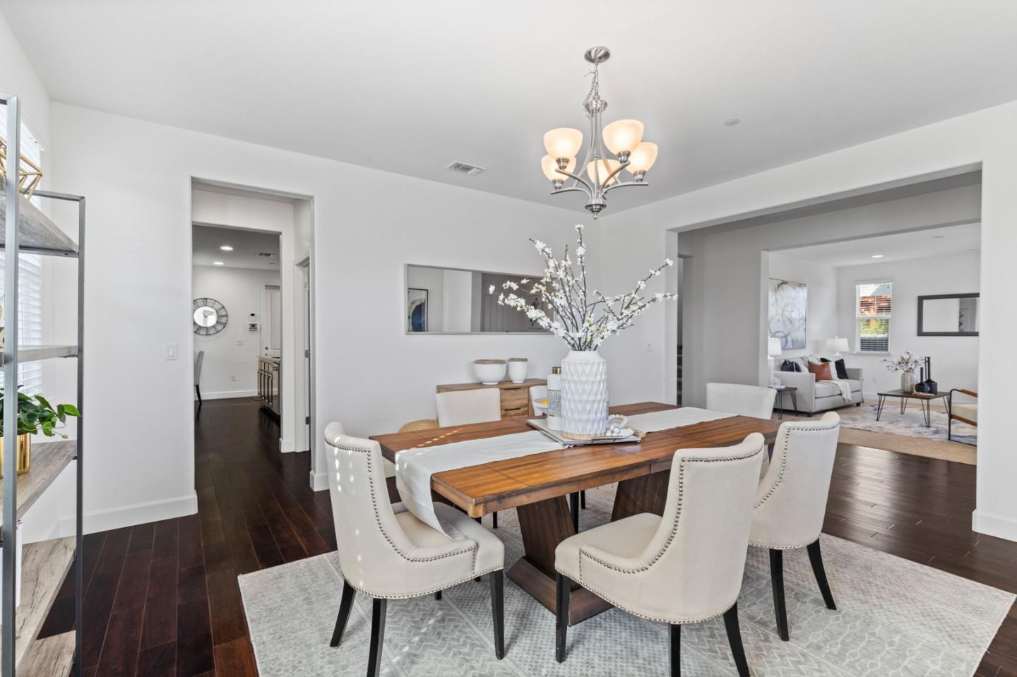 823 Sunrise Drive Gilroy, CA 95020 - Photo 5 of 46 a view of a dining room with furniture and wooden floor