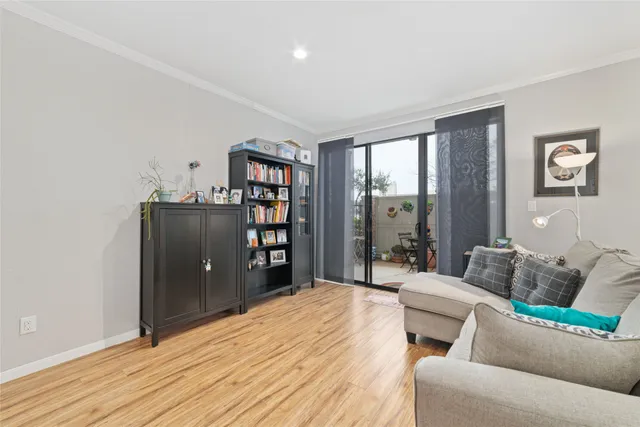 a bathroom with a shower and a sink