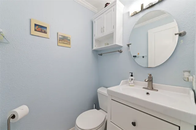a kitchen with granite countertop a stove and a microwave