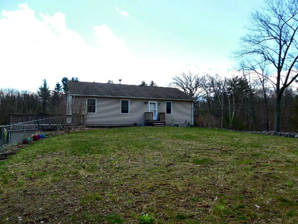 177 Osborne Road Ware, MA 01082 - Photo 3 of 25 a view of a house with a backyard