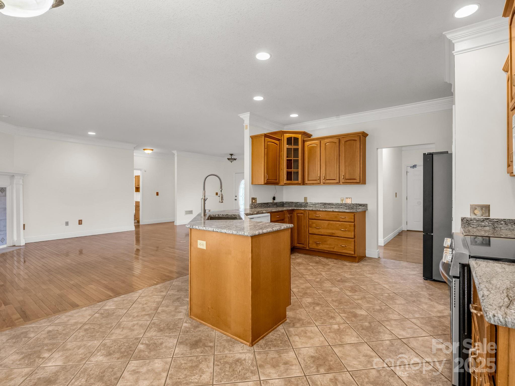 124 Shadow View Drive Leicester, NC 28748 - Photo 15 of 41 a large kitchen with stainless steel appliances a stove a sink a oven and a refrigerator