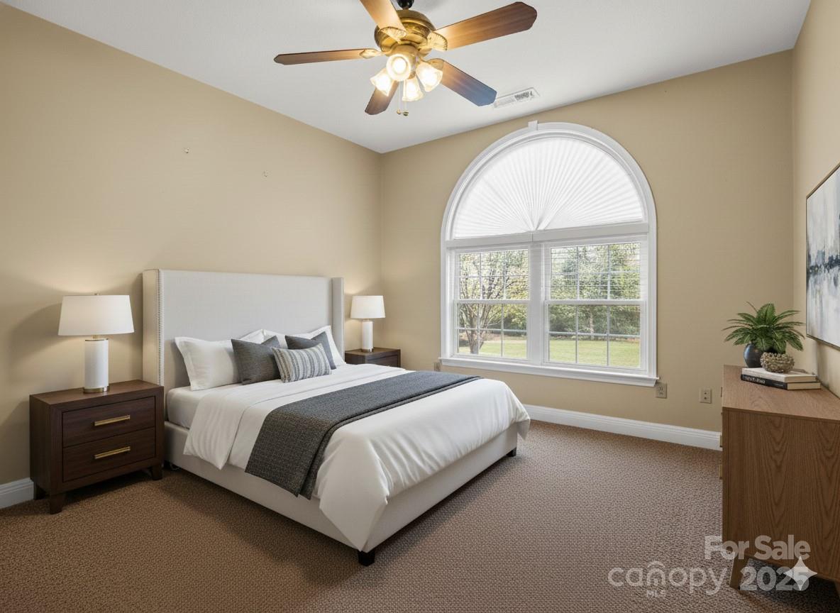 124 Shadow View Drive Leicester, NC 28748 - Photo 6 of 41 a bedroom with a bed and a large window
