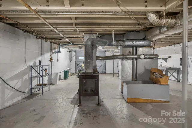 a view of a garage with wooden floors