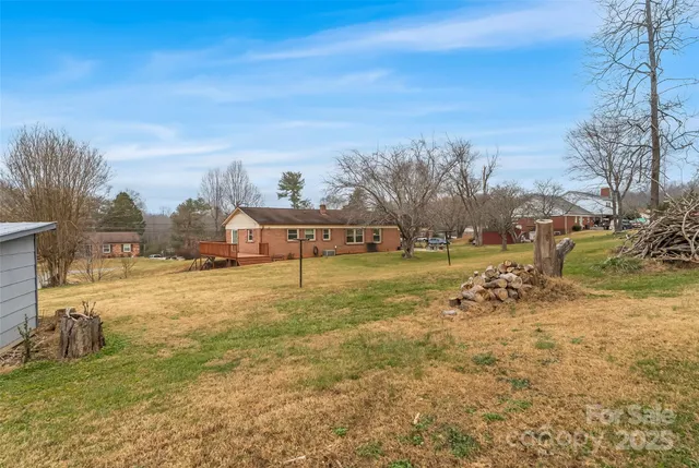 a view of a yard with an outdoor space