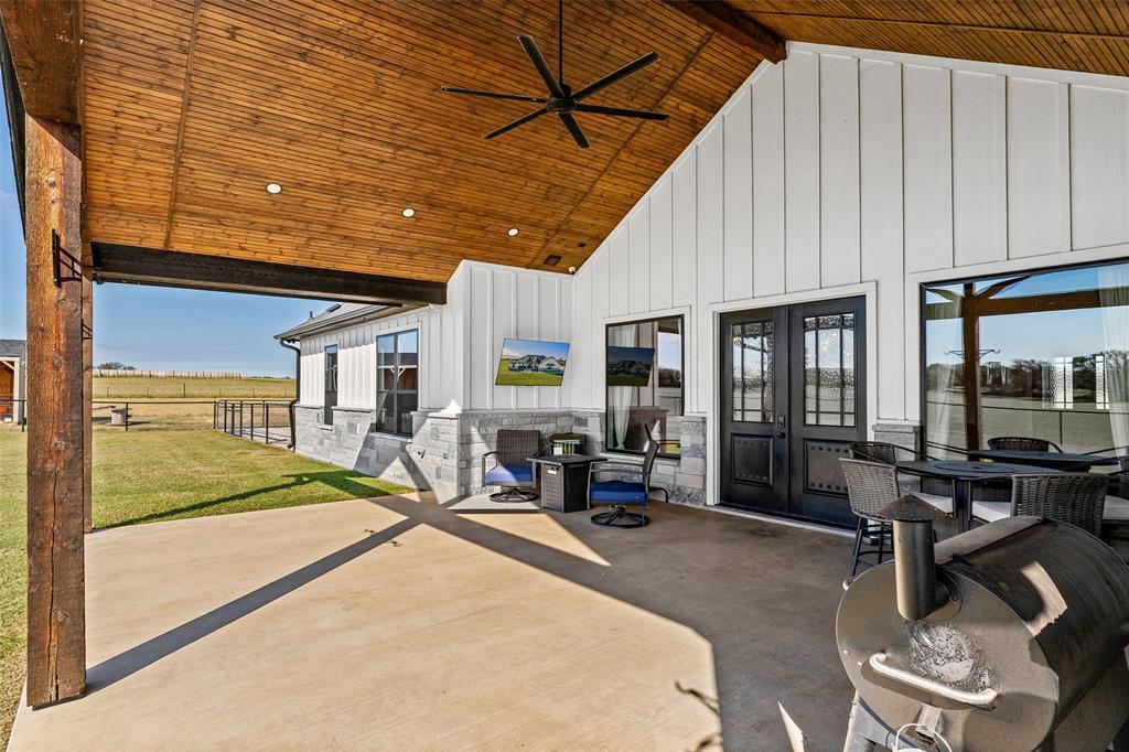 310 Runyan Rnch Road Tolar, TX 76476 - Photo 5 of 35 View of patio featuring french doors and ceiling fan