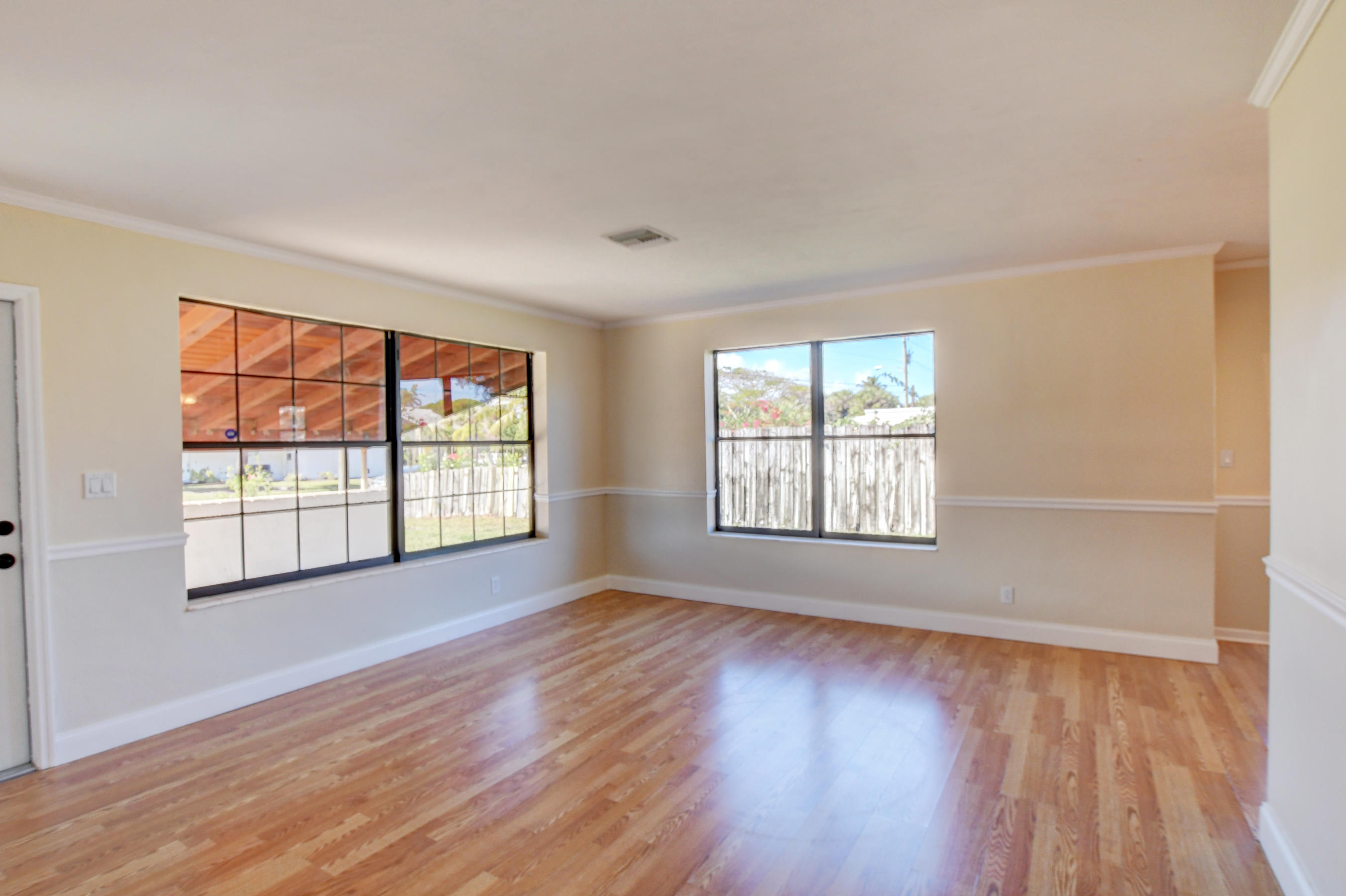 4554 Northeast 4th Avenue Boca Raton, FL 33431 - Photo 7 of 37 07_Living room with big windows