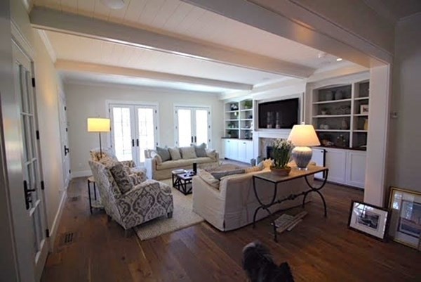 7 Mill Hill Farms Road Edgartown, MA 02539 - Photo 4 of 25 a living room with furniture hard wood floor and a window