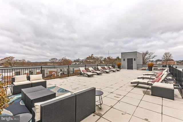 a view of a terrace with seating area