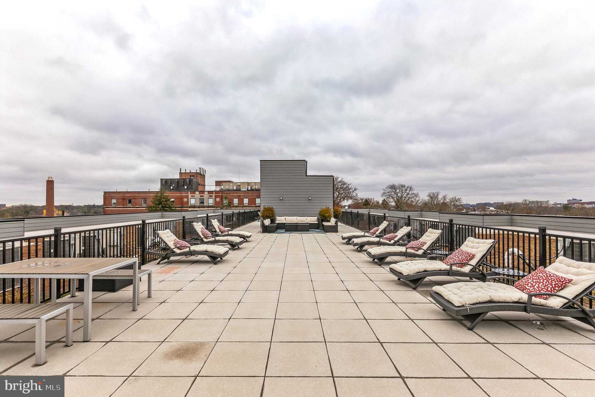 5801 Ridge Avenue, Unit 318 Philadelphia, PA 19128 - Photo 17 of 26 a view of roof deck with seating space