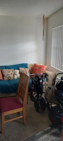 a kitchen with a sink a stove and cabinets