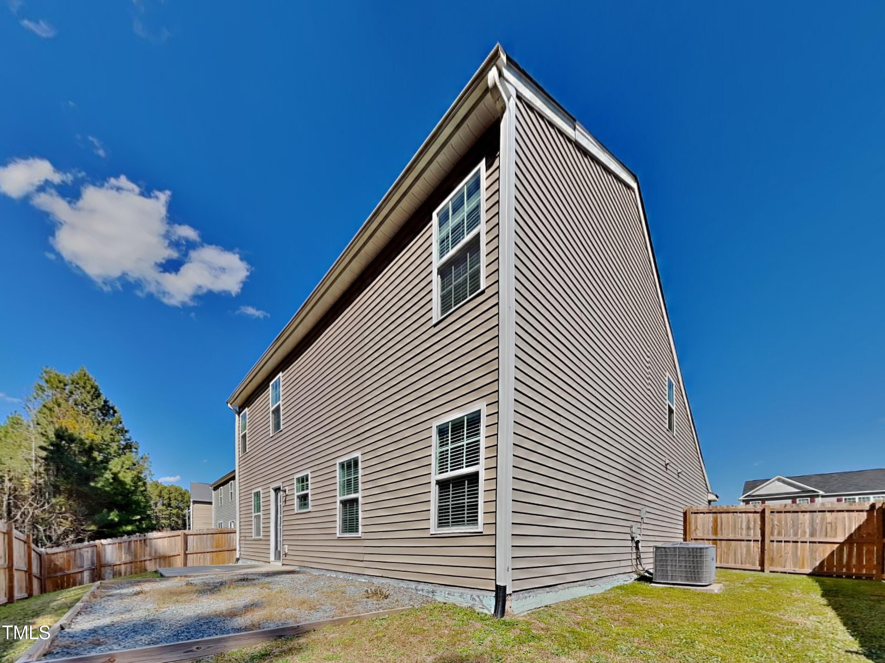 244 Botanical Court Bunnlevel, NC 28323 - Photo 18 of 18 a view of backyard of house