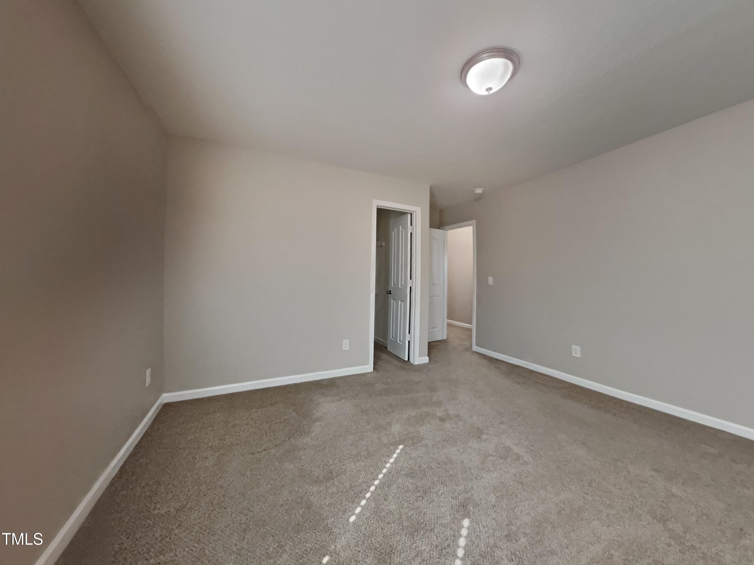 244 Botanical Court Bunnlevel, NC 28323 - Photo 10 of 18 a view of an empty room with a window