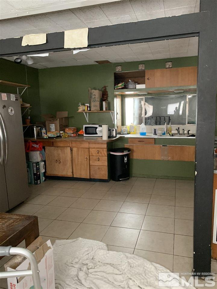 231 Cheney Street Reno, NV 89502 - Photo 8 of 13 a room with storage and utility