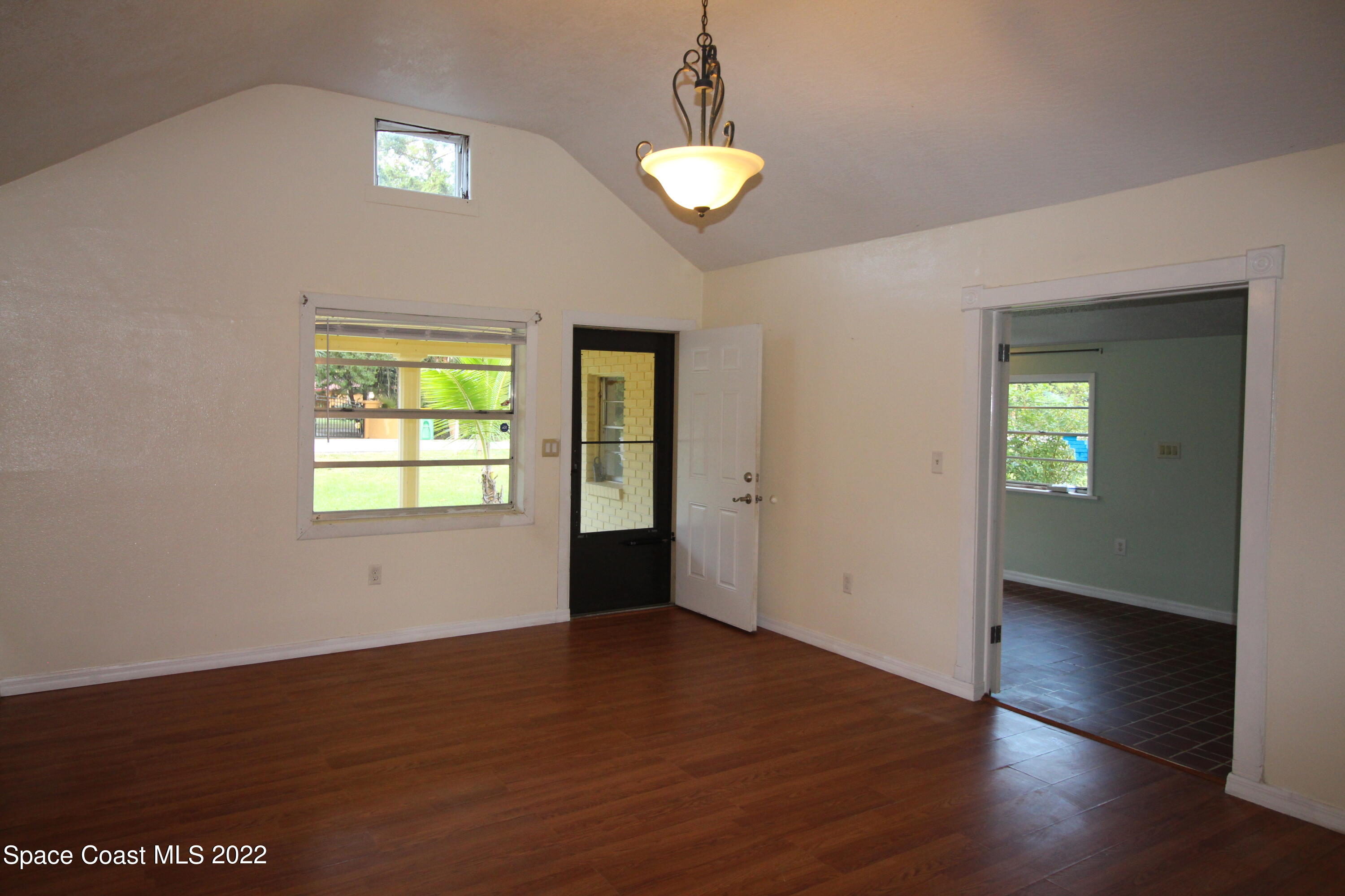 525 North Burnett Road Cocoa, FL 32926 - Photo 3 of 14 an empty room that has a window