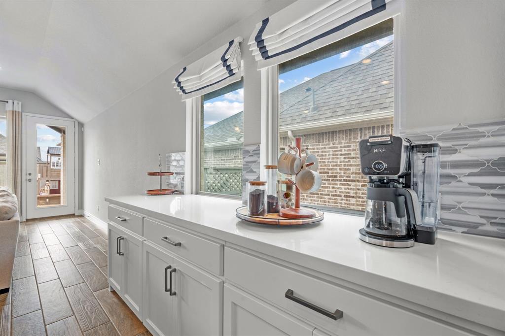 2425 Robin Way Northlake, TX 76247 - Photo 11 of 40 a kitchen with sink and window