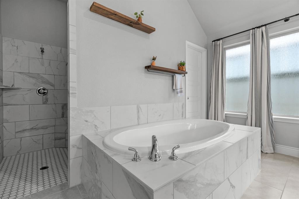 2425 Robin Way Northlake, TX 76247 - Photo 19 of 40 a bath tub sitting next to a shower