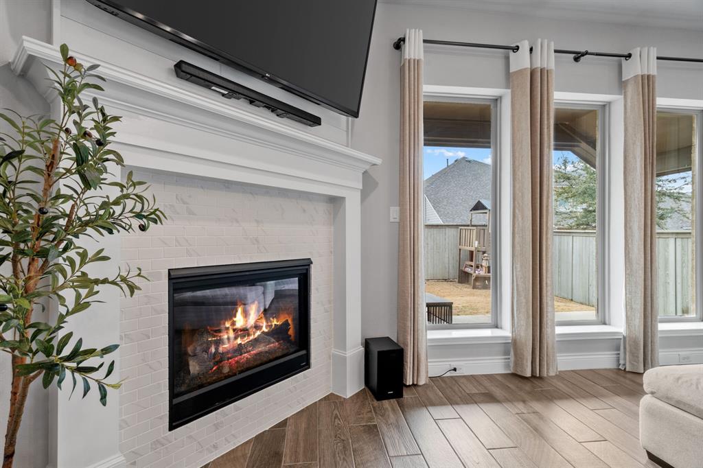 2425 Robin Way Northlake, TX 76247 - Photo 6 of 40 a living room with a fireplace