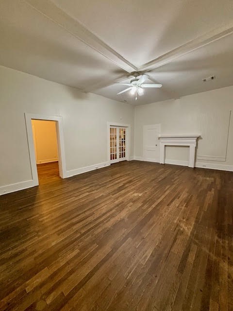 210 East Phillips Street Conroe, TX 77301 - Photo 17 of 27 a view of empty room with wooden floor