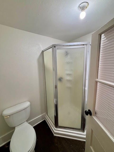 210 East Phillips Street Conroe, TX 77301 - Photo 19 of 27 a bathroom with a shower and toilet