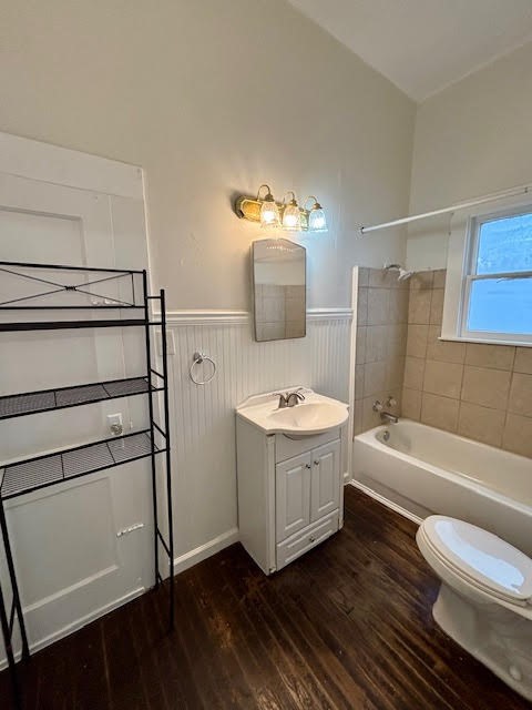 210 East Phillips Street Conroe, TX 77301 - Photo 20 of 27 a bathroom with a granite countertop sink toilet and bathtub